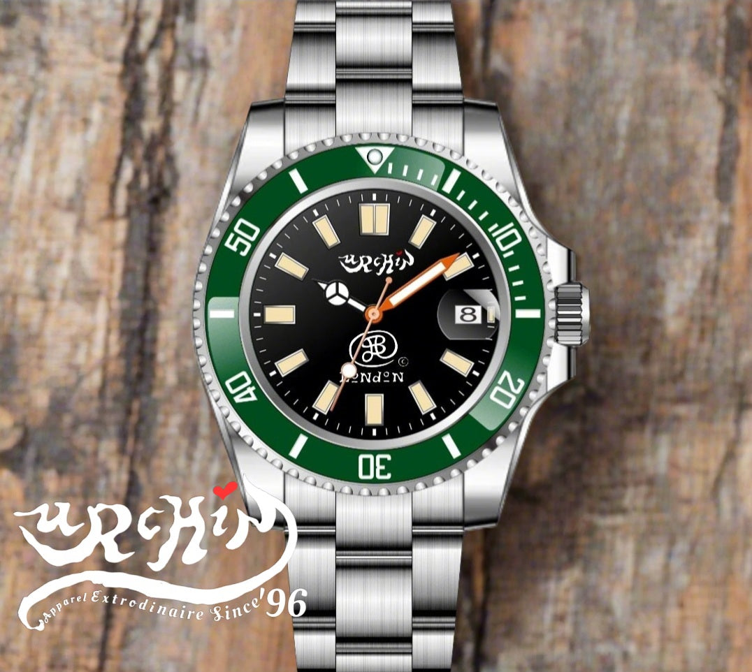 URCHIN Accessories & Watches. 'CRONOGRAPH DIVER' Black & Gold Face. 'Urchin'& 'JSP London' Logo. Green & White Bezel. Steel Body and Strap. *Made to order only.