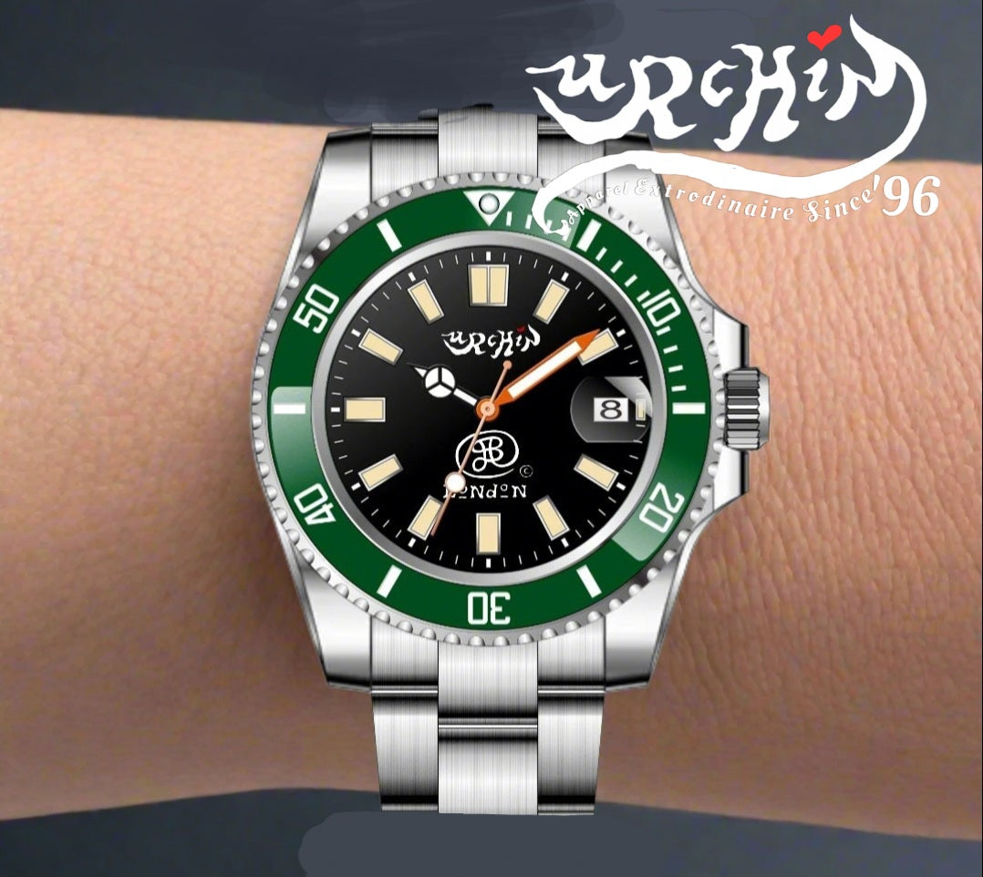 URCHIN Accessories & Watches. 'CRONOGRAPH DIVER' Black & Gold Face. 'Urchin'& 'JSP London' Logo. Green & White Bezel. Steel Body and Strap. *Made to order only.