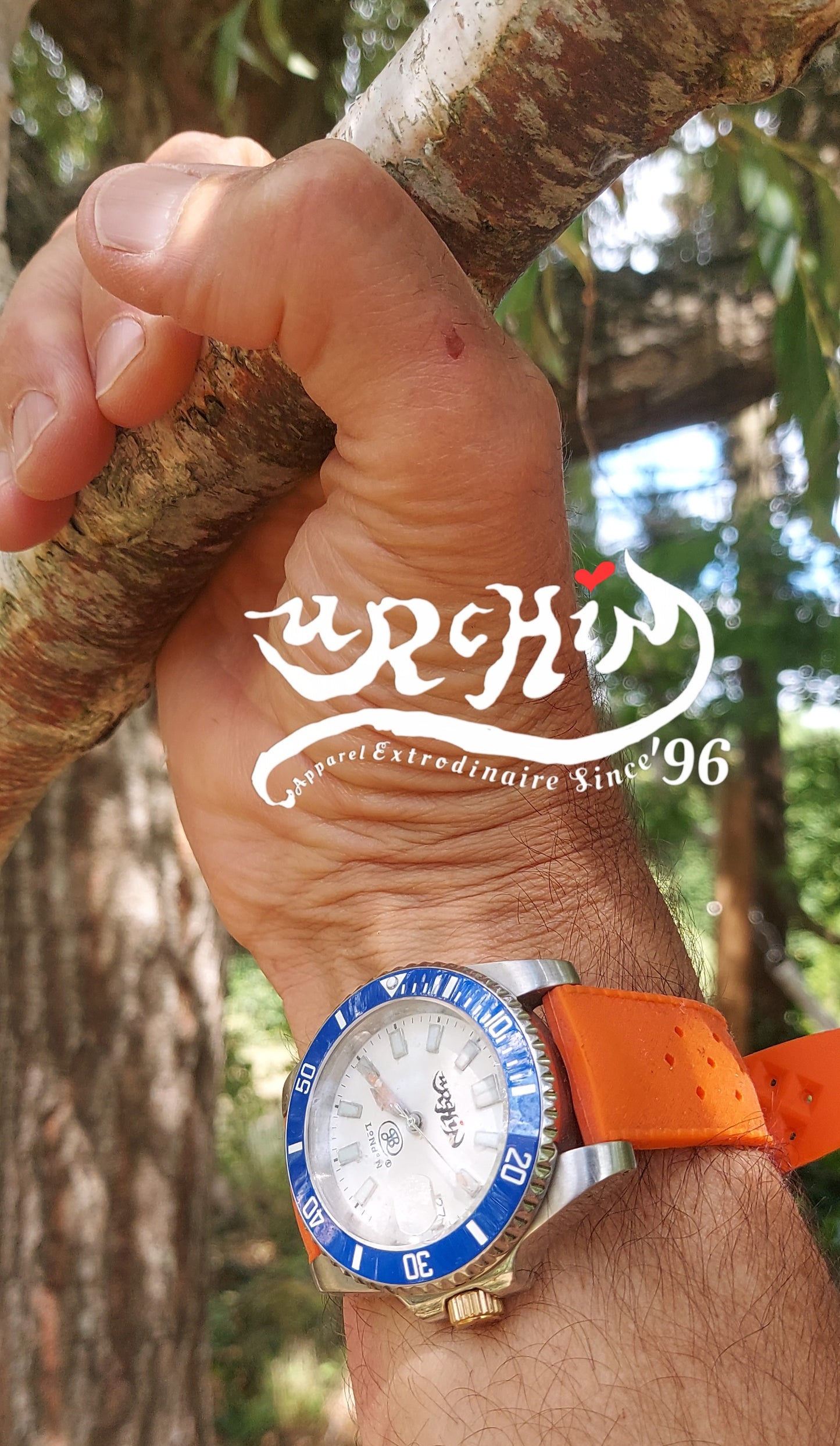 URCHIN Accessories & Watches. Limited Edition 'OYSTER DIVER' Blue & White 'Urchin London' Logo Watch. Orange Rubber Strap. *To Order only.